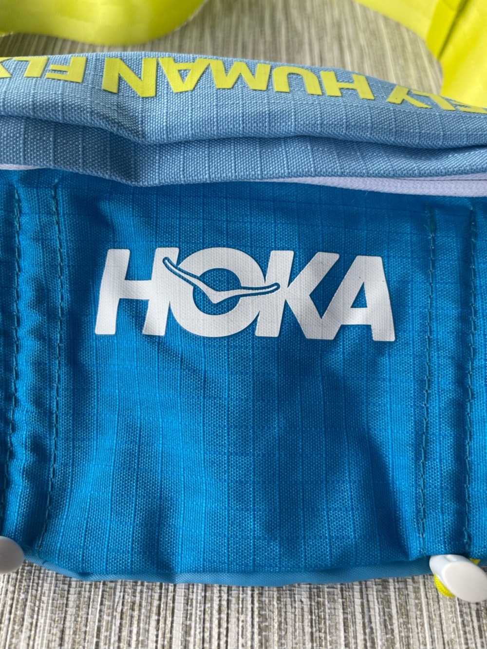 Hoka Adjustable Belt Fly Human Fly Running Waist Pack in Blue and Neon Yellow - Picture 3 of 15